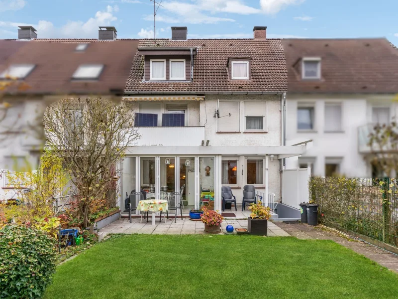 Rückansicht - Haus kaufen in Bielefeld - Bielefeld: Gemütliches Reihenmittelhaus mit vielen Nutzungsmöglichkeiten