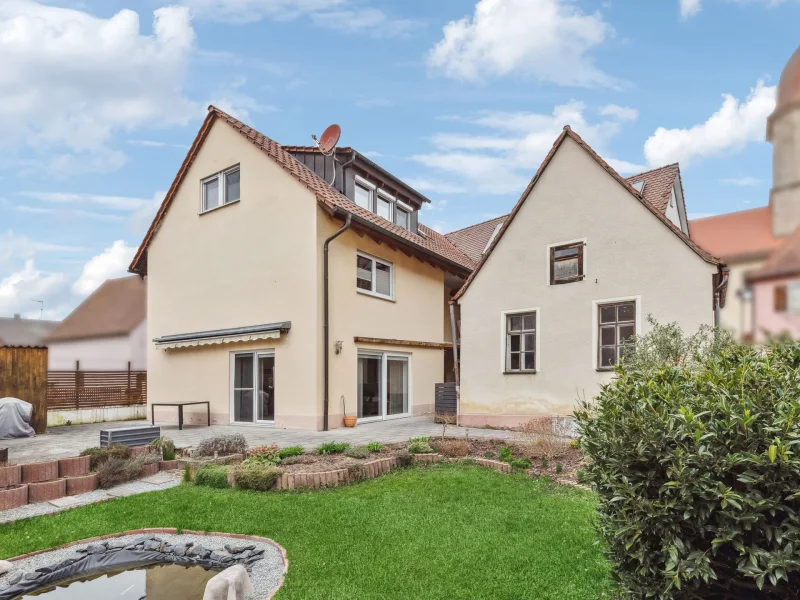 Titelbild - Haus kaufen in Ammerndorf - Gepflegtes Einfamilienhaus mit Werkstatt- und Nebengebäude in Ammerndorf