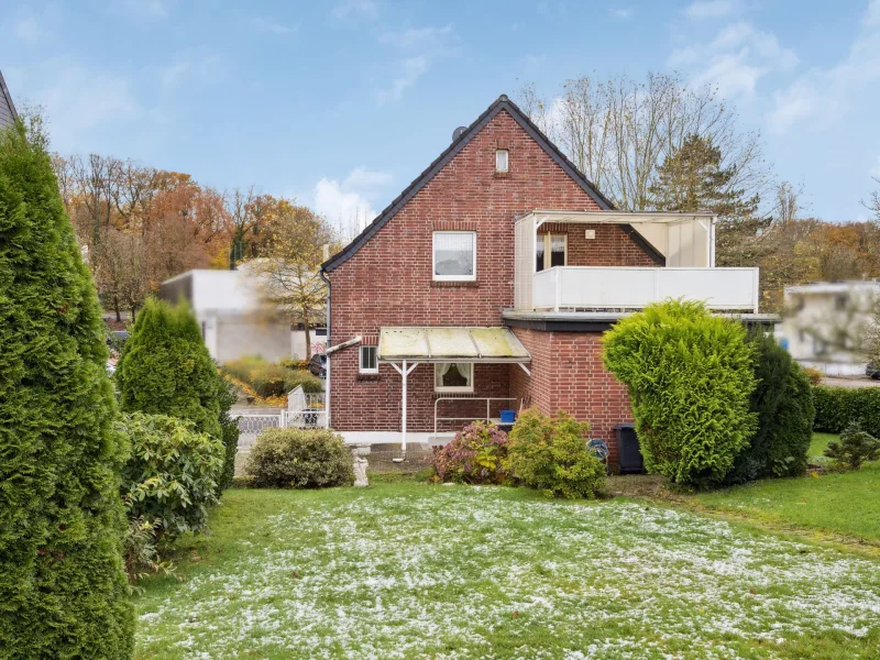 Rückansicht und Garten - Haus kaufen in Übach-Palenberg - Familienfreundliches Einfamilienhaus in zentraler und dennoch ruhiger Lage von Übach-Palenberg