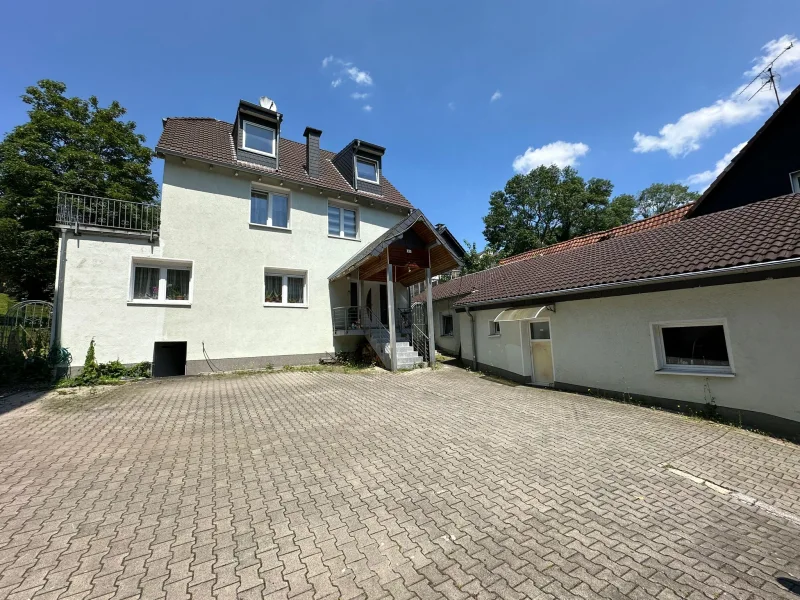 Titelbild - Haus kaufen in Hagen - Potentielles Dreifamilienhaus mit ca. 231 m² in zentraler Lage von Hagen Remberg