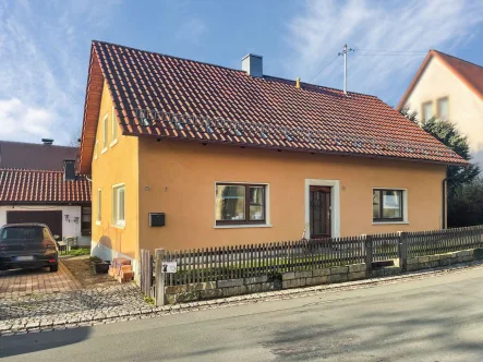 Objektansicht - Haus kaufen in Rugendorf - Gemütliches Einfamilienhaus mit Potenzial in ruhiger Lage von Rugendorf