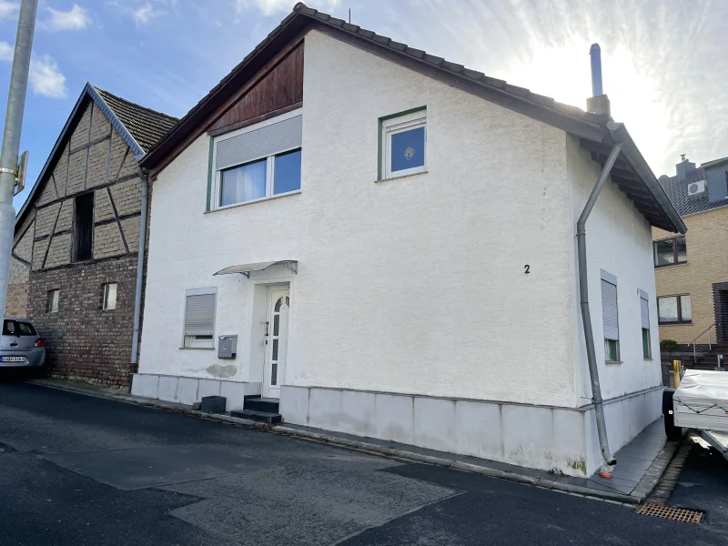 Titelbild - Haus kaufen in Rheinbach - Kleines Einfamilienhaus in Rheinbach - Wormersdorf