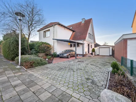 Titelbild - Haus kaufen in Hamm - Charmantes Einfamilienhaus mit 5 Zimmern und Garage in Hamm Westfalen - Lohauserholz