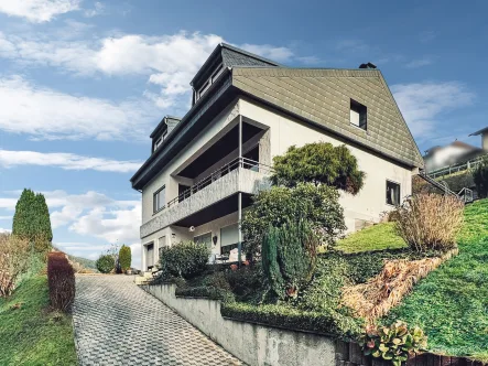 Titelbild - Haus kaufen in Oberzent - Wunderschönes Einfamilienhaus in malerischer Umgebung in Oberzent-Gammelsbach