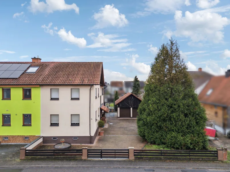 Titelbild - Haus kaufen in Schifferstadt - Doppelhaushälfte mit großem Garten und Regenwasserauffangbecken in Schifferstadt