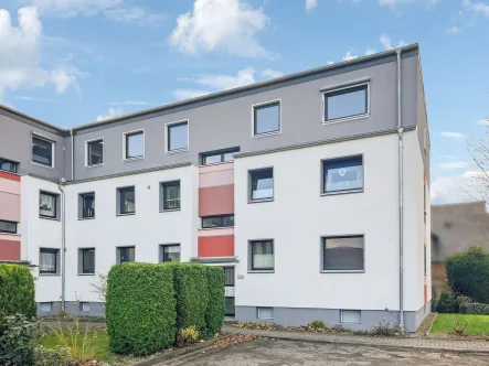 Titelbild - Wohnung kaufen in Wolfenbüttel - Ordentliche 4-Zimmerwohnung mit ca. 87 m² Wohnfläche im 1. Obergeschoss - Wolfenbüttel