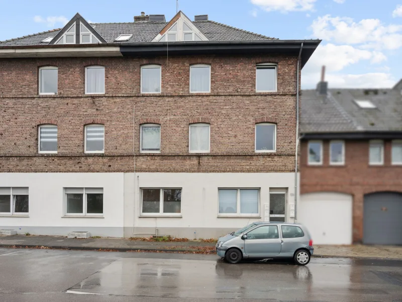 Titelbild - Haus kaufen in Herzogenrath - Herzogenrath - Gepflegtes 4-Parteienhaus in zentraler Lage von Merkstein