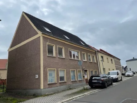 Titelbild - Haus kaufen in Wanzleben - Modernisierungsbedürftiges Haus für Heimwerker in Wanzleben