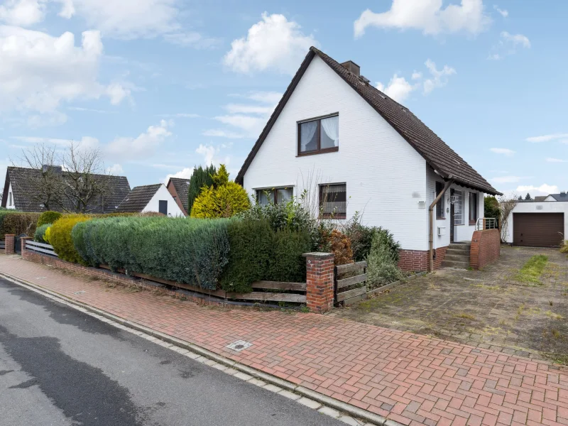 Straßenansicht - Haus kaufen in Barsbüttel - Gemütliches Einfamilienhaus auf ca. 500 m² großem Grundstück im beliebten Barsbüttel-Willinghusen