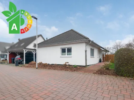 Hausansicht 1 - Haus kaufen in Cuxhaven - Moderner Bungalow in Top-Zustand – Komfortables Wohnen auf einer Ebene in Cuxhaven