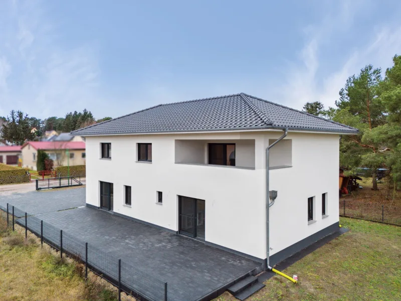 Ansicht - Haus kaufen in Königs Wusterhausen - Sorgenfrei in die Zukunft! Erstbezug in ein traumhaftes Niedrigenergiehaus Nahe Zeesener See