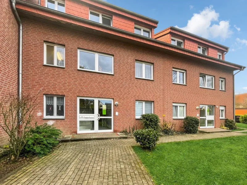 Hausansicht - Wohnung kaufen in Osnabrück - Großzügige Dachgeschosswohnung mit super Raumaufteilung und Balkon in Osnabrück/Atter