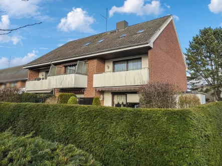 Balkonansicht - Wohnung kaufen in Scharbeutz - Vermietete 2-Zimmer-Wohnung mit Balkon in ruhiger Wald- und Golfplatznähe in Scharbeutz