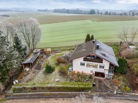 Titelbild - Haus kaufen in Heldenstein - Einfamilienhaus in Heldenstein