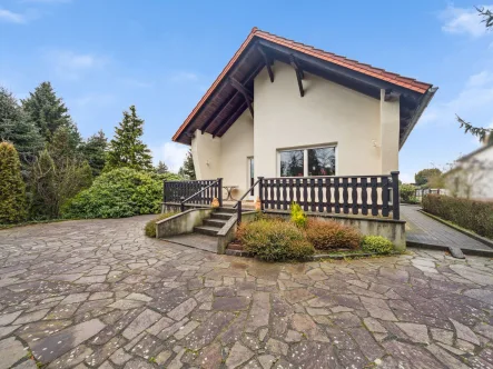 Titelbild - Haus kaufen in Bennewitz - Charmantes Einfamilienhaus in besonders ruhiger und kinderfreundlicher Lage von Bennewitz bei Wurzen