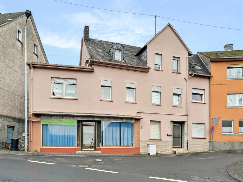 Titel - Haus kaufen in Idar-Oberstein - Einfamilienhaus mit vermieteter Einliegerwohnung in Idar