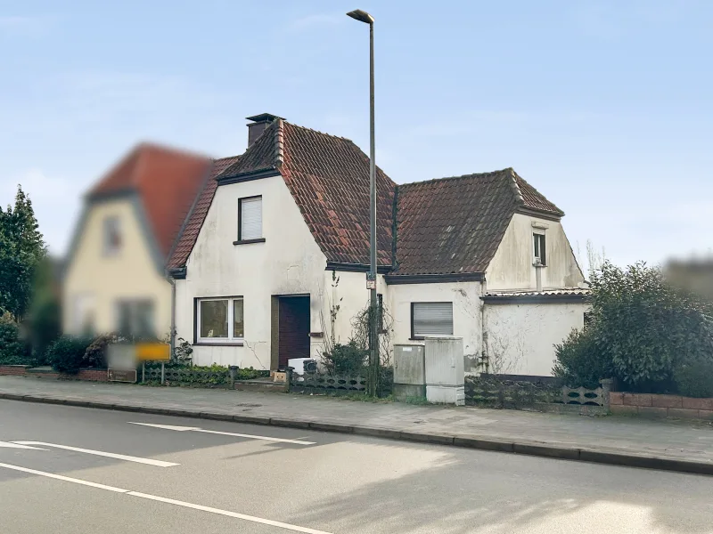 Titelbild - Haus kaufen in Bramsche - Renovierungsbedürftiges Zuhause für kreative Köpfe - Doppelhaushälfte in Osnabrück-Bramsche