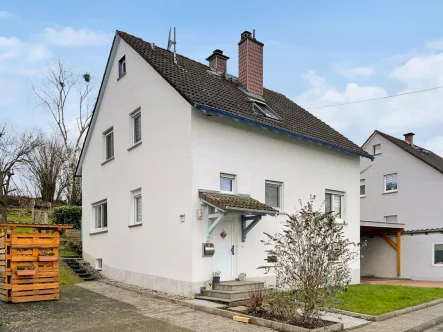 Titel - Haus kaufen in Brachttal - Charmantes Einfamilienhaus mit Garten und Kamin – Ihr neues Zuhause in idyllischer Lage in Brachttal