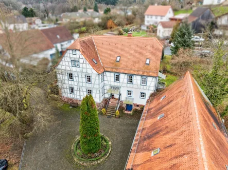 Titelbild - Haus kaufen in Bad König - Denkmalgeschützte Mühle mit modernem Wohnkomfort auf ca. 6.000 m² Grundstück in Bad König - Zell