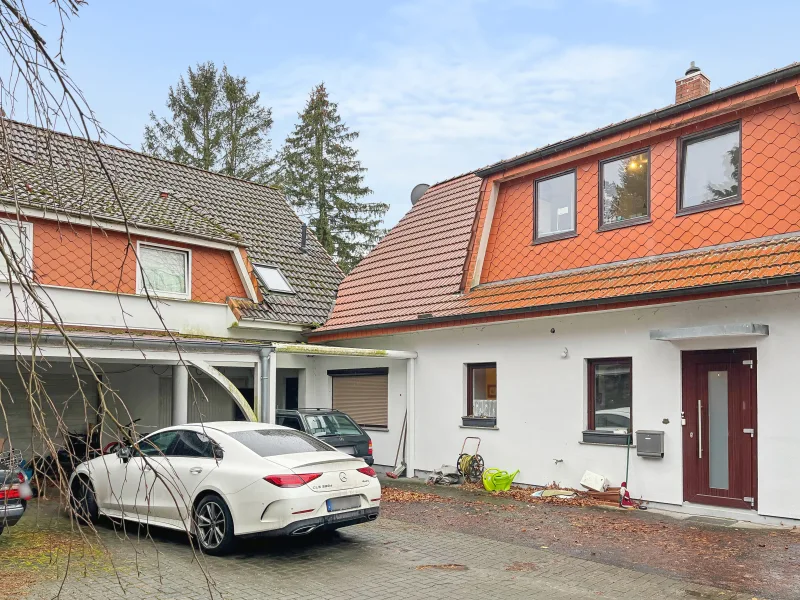 Ansicht - Haus kaufen in Loxstedt - Besonderes Zweifamilienhaus mit zusätzlicher Einliegerwohnung in Loxstedt