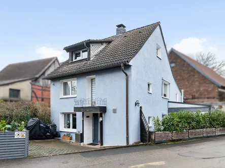 Titelbild - Haus kaufen in Hagen - Ihr neues Zuhause: Renoviertes Häuschen im Fachwerkstil in Hagen-Garenfeld