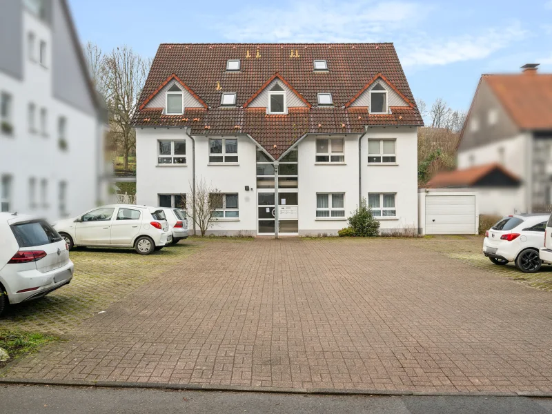 Titelbild - Wohnung kaufen in Hagen - Schicke Souterrainwohnung mit Stellplatz in bevorzugter Lage von Hagen-Holthausen