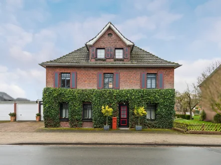 Titelbild - Haus kaufen in Alpen - Gepflegtes und charmantes freistehendes Einfamilienhaus im schönen Alpen Menzelen