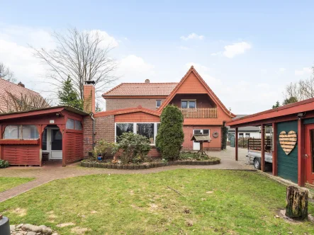 Gartenansicht - Haus kaufen in Friedeburg - Charmantes Einfamilienhaus mit Einliegerwohnung und vielen Extras in Friedeburg