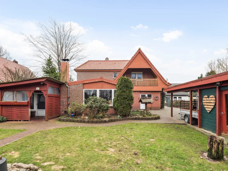 Gartenansicht - Haus kaufen in Friedeburg - Charmantes Einfamilienhaus mit Einliegerwohnung und vielen Extras in Friedeburg