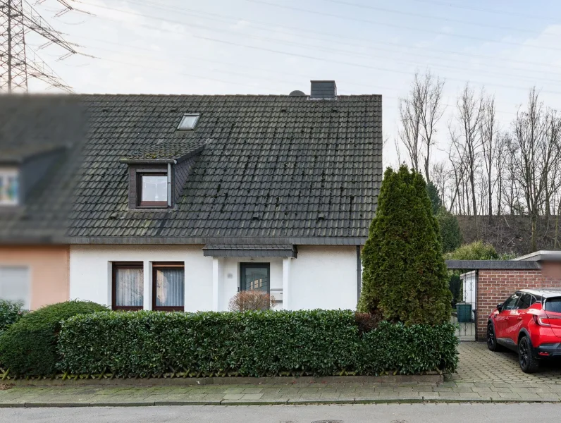 Titelbild - Haus kaufen in Duisburg - Gut gepflegte Doppelhaushälfte in ruhiger Lage von Duisburg-Walsum