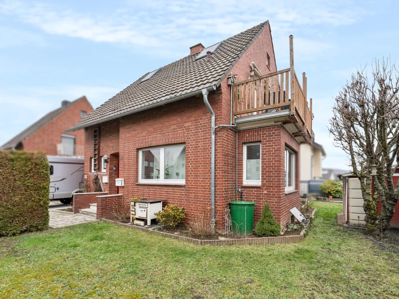 Titelbild - Haus kaufen in Grevenbroich - Modernes Zweifamilienhaus mit ca. 208 m² Wohnfläche in TOP Zustand in Grevenbroich-Frimmersdorf