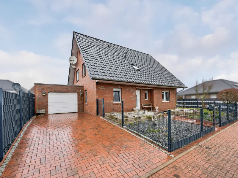 Frontansicht - Haus kaufen in Stemwede - Modern und gemütlich: Perfektes Familienhaus in ruhiger Lage von Stemwede