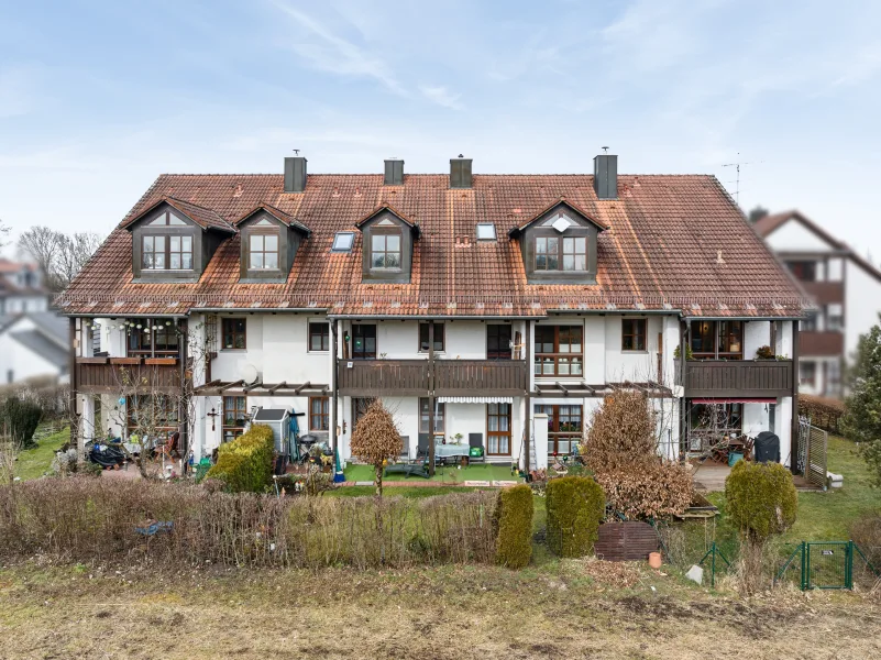 Titelbild - Wohnung kaufen in Aschheim - Familienfreundliche, ruhig gelegene 4-Zimmer-Eigentumswohnung mit tollem Blick ins Grüne in Aschheim