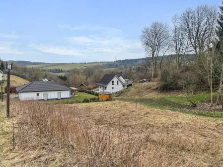 Titelbild - Grundstück kaufen in Dahlem - Exklusives Baugrundstück in malerischer Hanglage nahe des historischen Burgrings von Dahlem