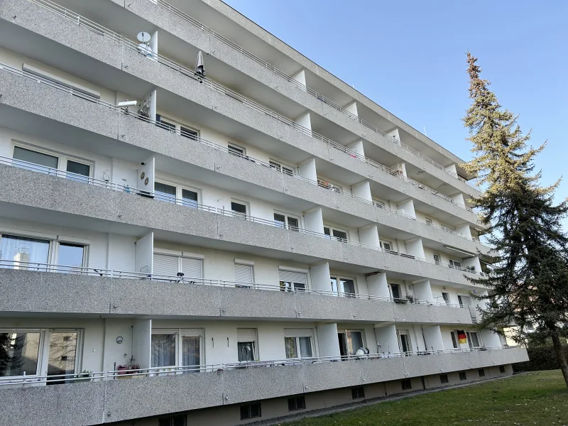 Das Haus - Wohnung kaufen in Karlsfeld - Solide Kapitalanlage! Gut vermietete 2-Zimmer-Eigentumswohnung im Zentrum von Karlsfeld bei München