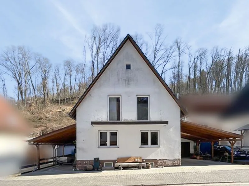 Titelbild - Haus kaufen in Thaleischweiler-Fröschen - Vielseitiges Mehrfamilienhaus in ruhiger Sackgassenlage von Thaleischweiler-Fröschen