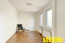 Schlafzimmer mit kleinem Balkon