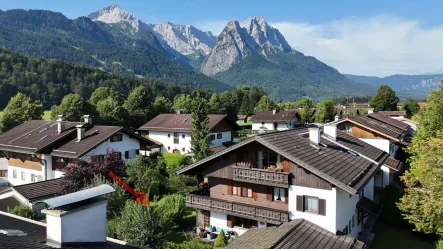  - Wohnung kaufen in Garmisch-Partenkirchen - Gemütliche 2/3-Zi-WHG mit Kamin und großzügiger Terrasse