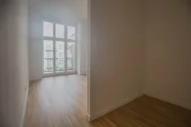 Schlafzimmer mit Balkon