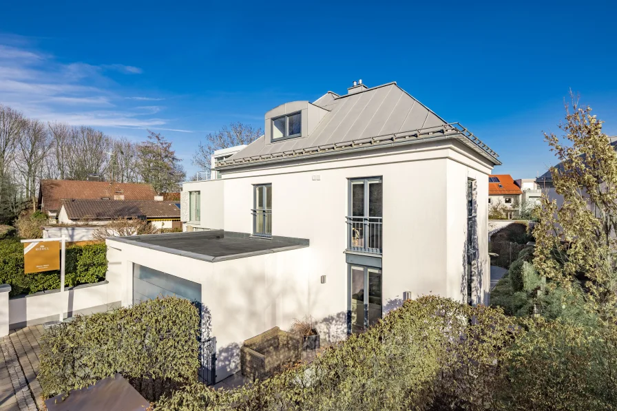 Sonne von morgens bis abends - Haus kaufen in München - In ruhiger Toplage: Modernes Einfamilienhaus mit sehr effizienter Wärmepumpe