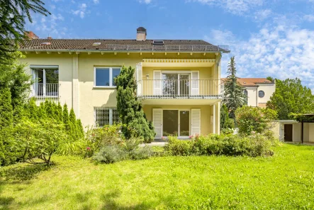 Sonnige Südausrichtung - Haus kaufen in München - Haushälfte mit 8 Zimmern und möglicher Baureserve zur Modernisierung