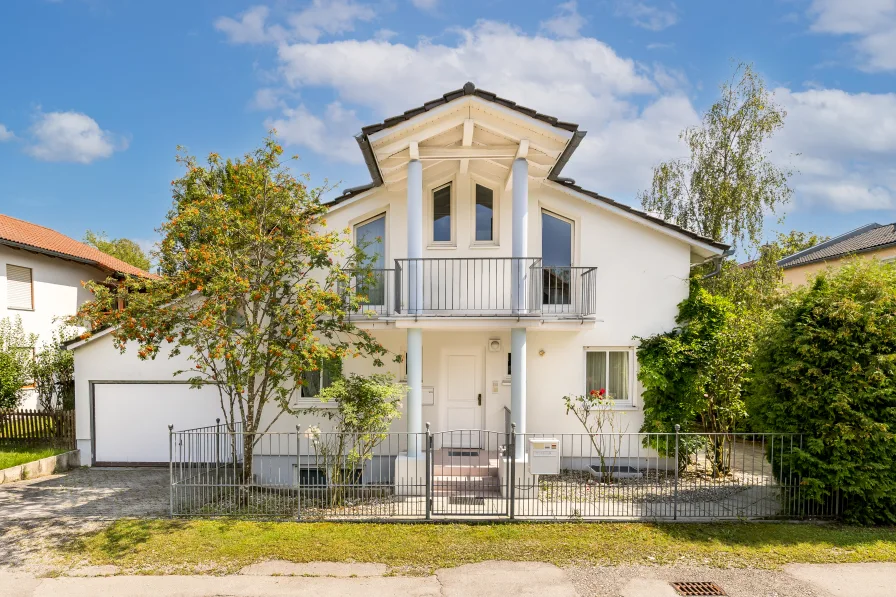 Zeitlos-elegante Architektur - Haus kaufen in Gauting - Idyllische, ruhige Bestlage: Freistehendes Einfamilienhaus mit großem Raumangebot