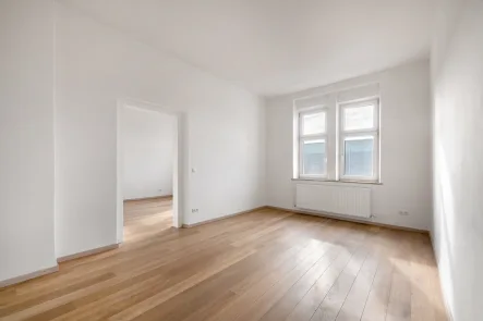 Behagliche Atmosphäre - Wohnung kaufen in München - Ideal geschnittene 3-Zimmer-Wohnung mit Potenzial in sehr begehrter, ruhiger Lage