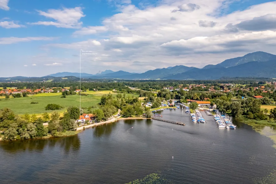 Traumlage am Chiemsee - Grundstück kaufen in Übersee - Exklusives Seegrundstück mit Potenzial zur Neubebauung