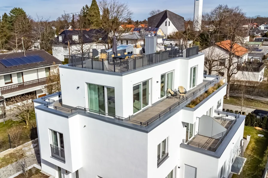 Wohnen über zwei Ebenen - Wohnung kaufen in München - Neubau/Erstbezug: Exquisite Penthouse-Maisonette mit Rooftop-Terrasse in ruhiger Lage