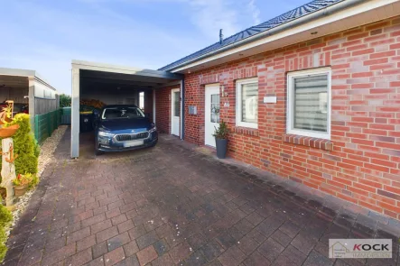 11625 Carport  - Haus kaufen in Barßel / Barßelermoor - Liebevoll gepflegter Bungalow mit Carport und 2 Terrassen im Seemannsort Barßel zu verkaufen