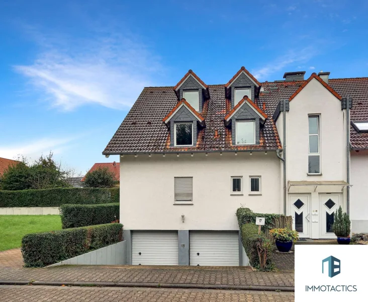 Außenansicht - Wohnung kaufen in Stadecken-Elsheim - Maisonette-Wohntraum in Stadecken-Elsheim - 140m² + Garage - viel Platz für Ihre Wünsche