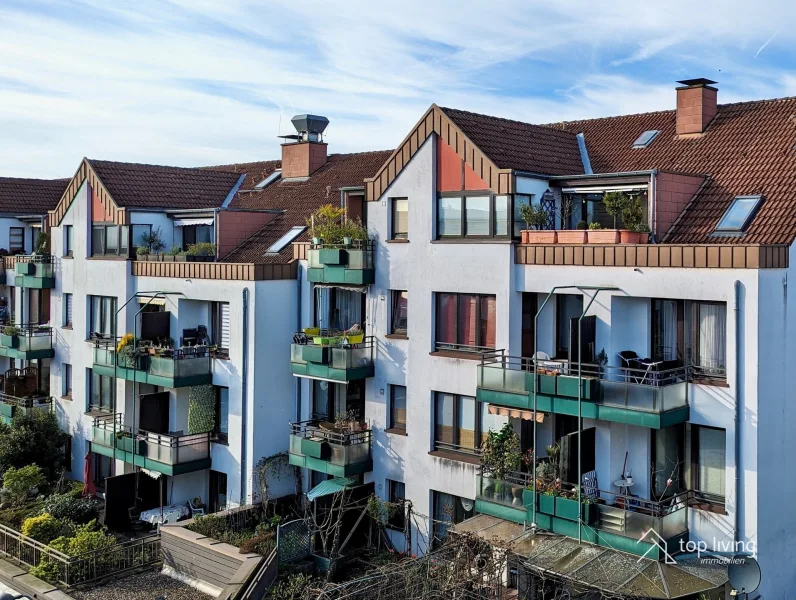 Außenansicht - Wohnung kaufen in Erkrath - Ruhige Wohlfühloase über den Dächern von Hochdahl: Schöne 3-Zimmerwohnung mit Süd-Balkon