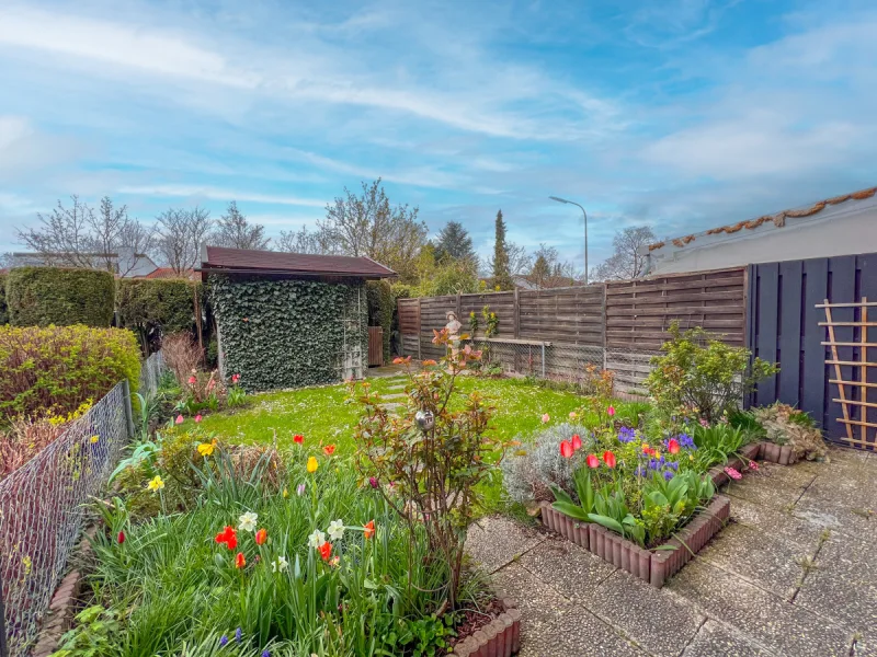 Garten - Haus kaufen in Kirchheim - Familientraum mit Potential: gepflegtes Reihenmittelhaus mit Südgarten