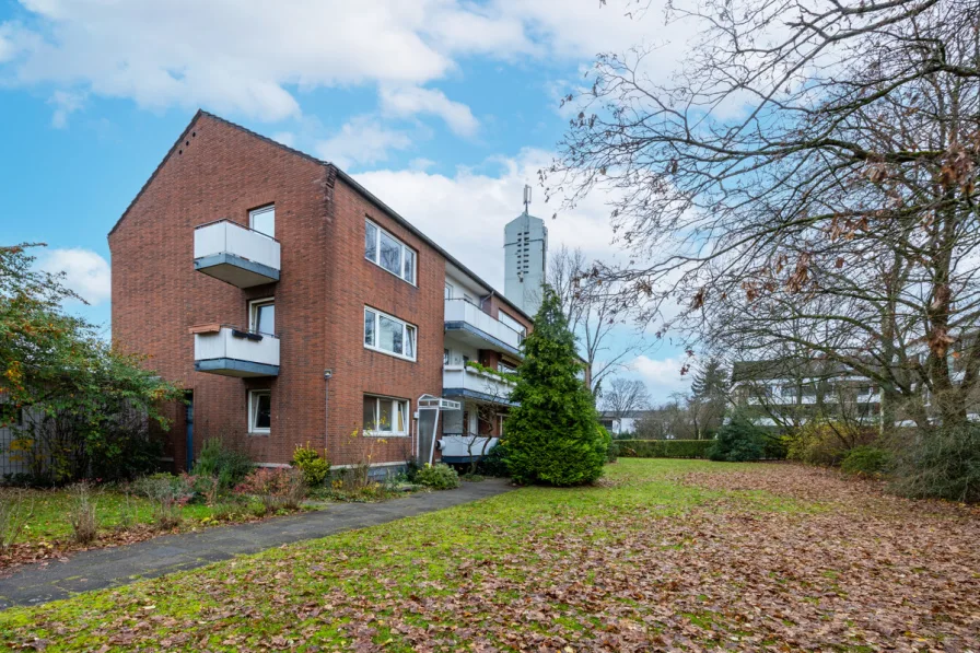Aussenansicht - Wohnung kaufen in Düsseldorf / Urdenbach - potentialreiche, gut geschnittene 4- Zimmer Wohnung in schöner Wohnlage in Urdenbach